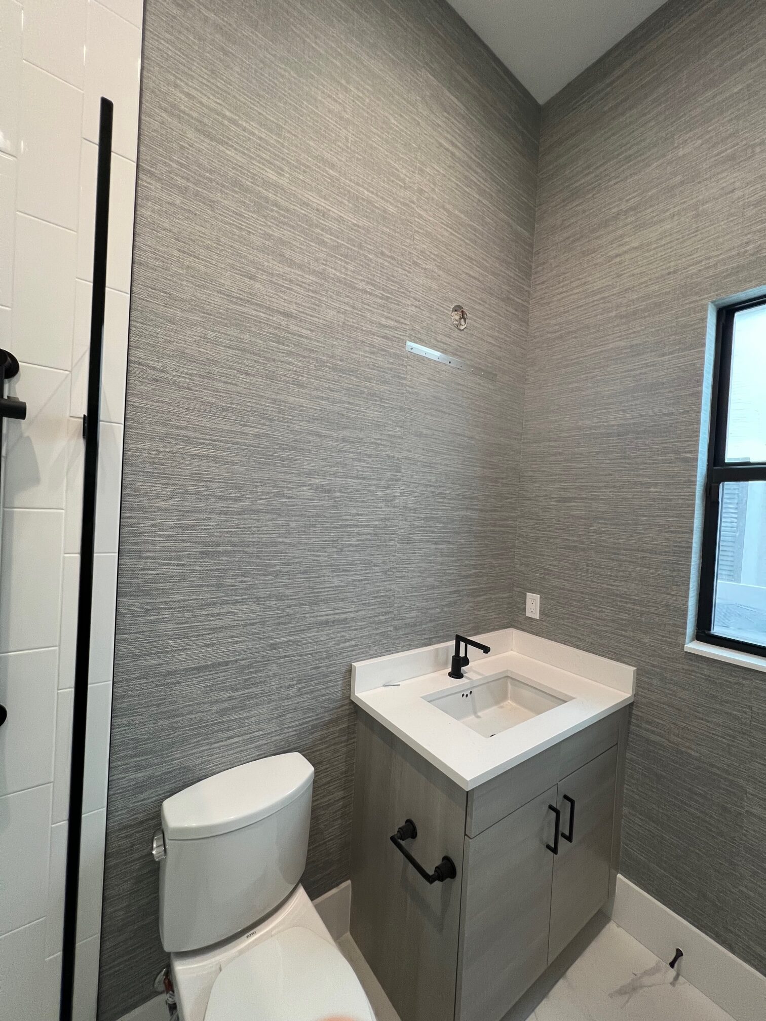 Before: Basic powder room